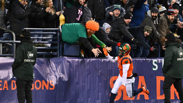 Feb 23, 2023; Seattle, WA, USA; Seattle Sea Dragons wide receiver Jahcour Pearson (3) celebrates with fans after scoring a touchdown against the St. Louis Battlehawks during the first half at Lumen Field. Mandatory Credit: Steven Bisig-USA TODAY Sports  